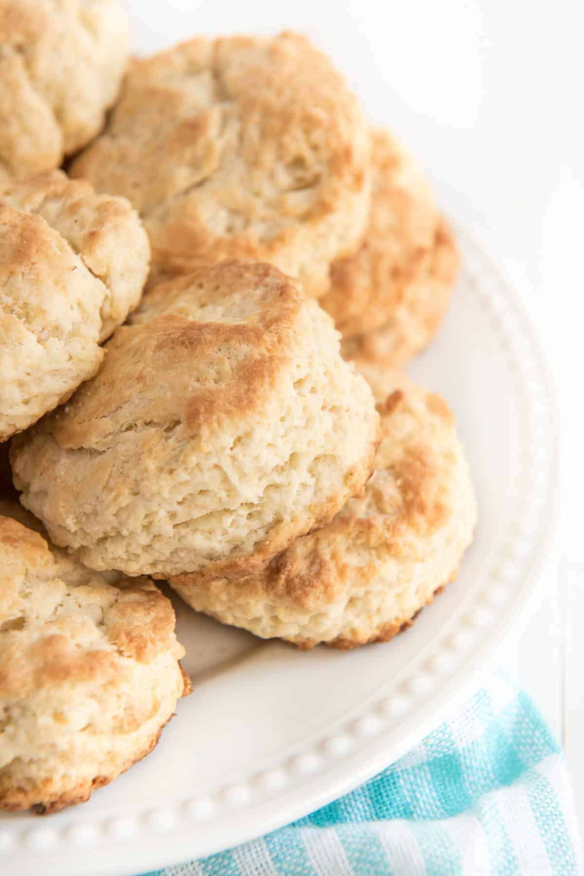 white plate of butter biscuits.