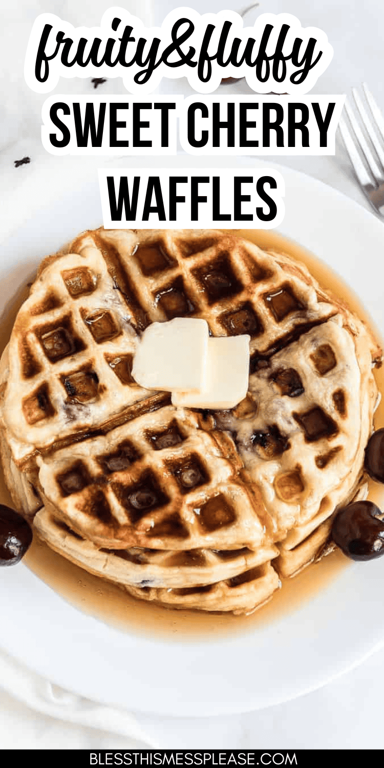 A plate showcasing fruity and fluffy cherry waffles adorned with two squares of butter and a syrup drizzle. Scattered cherries add a pop of color. Text at the top reads, sweet cherry waffles.