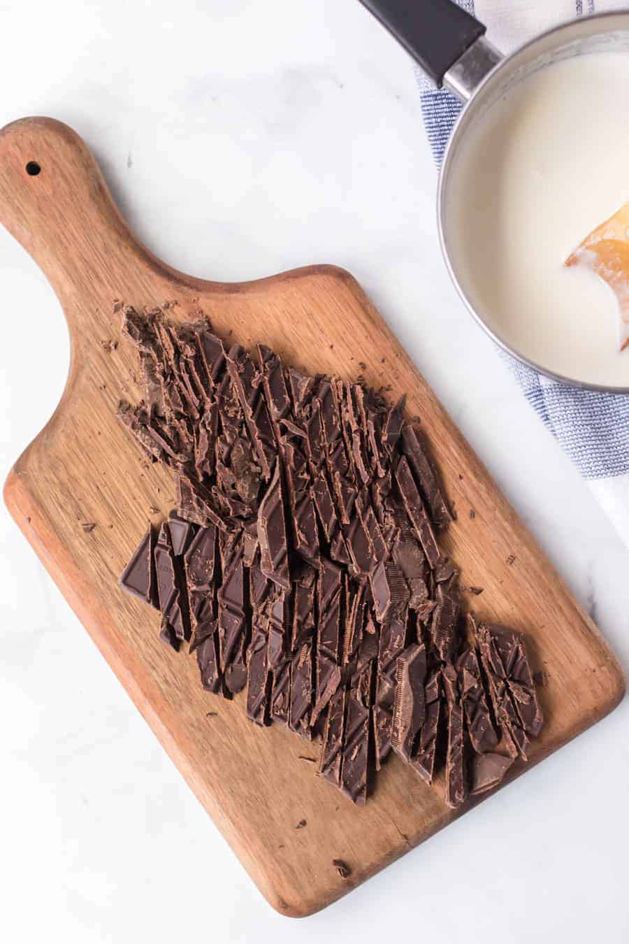 diced up chocolate bits on a cutting board.