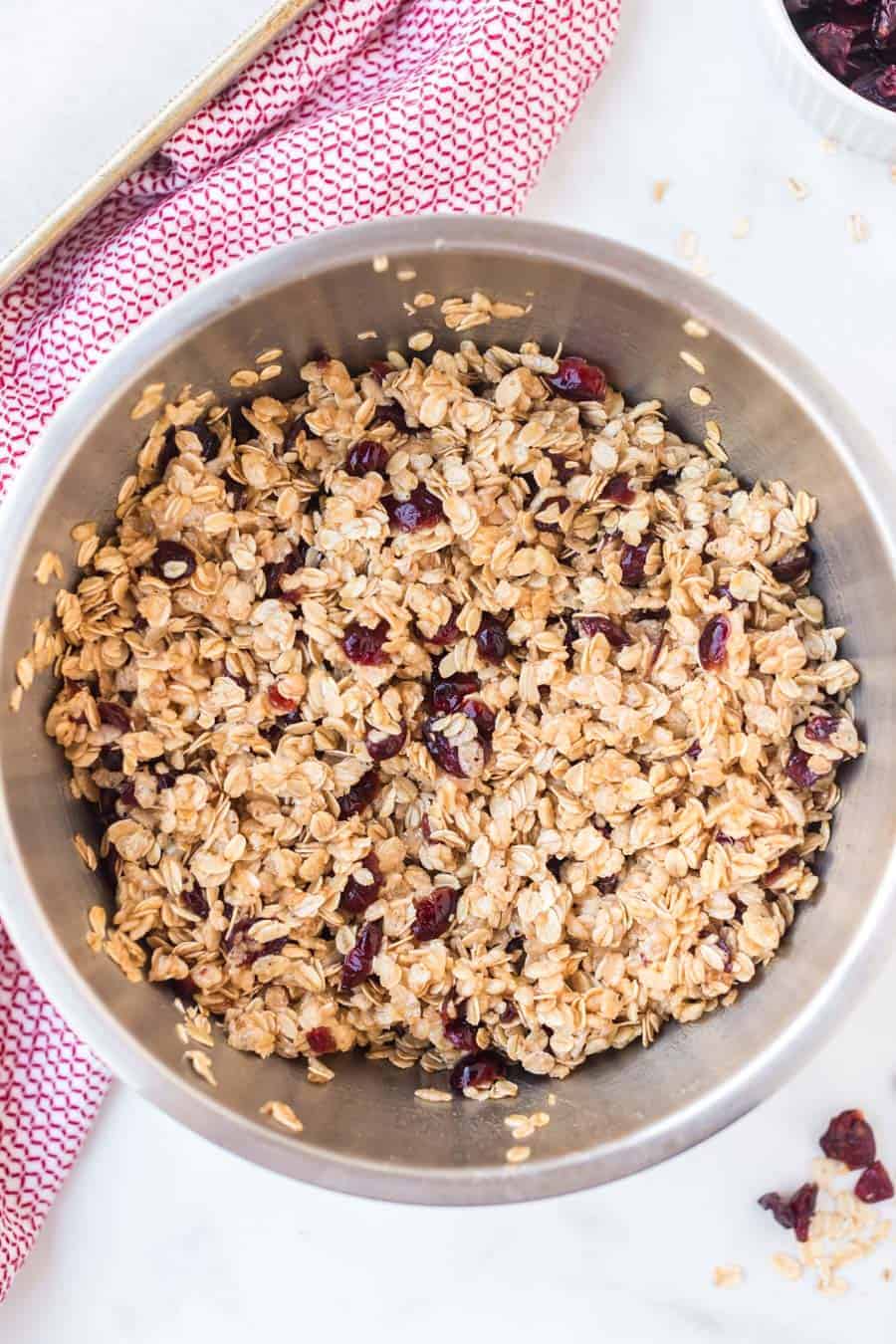 a bowl of cranberry granola bar mix.