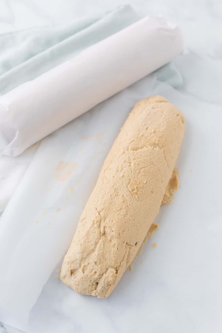 a hand rolled log of cookie dough.