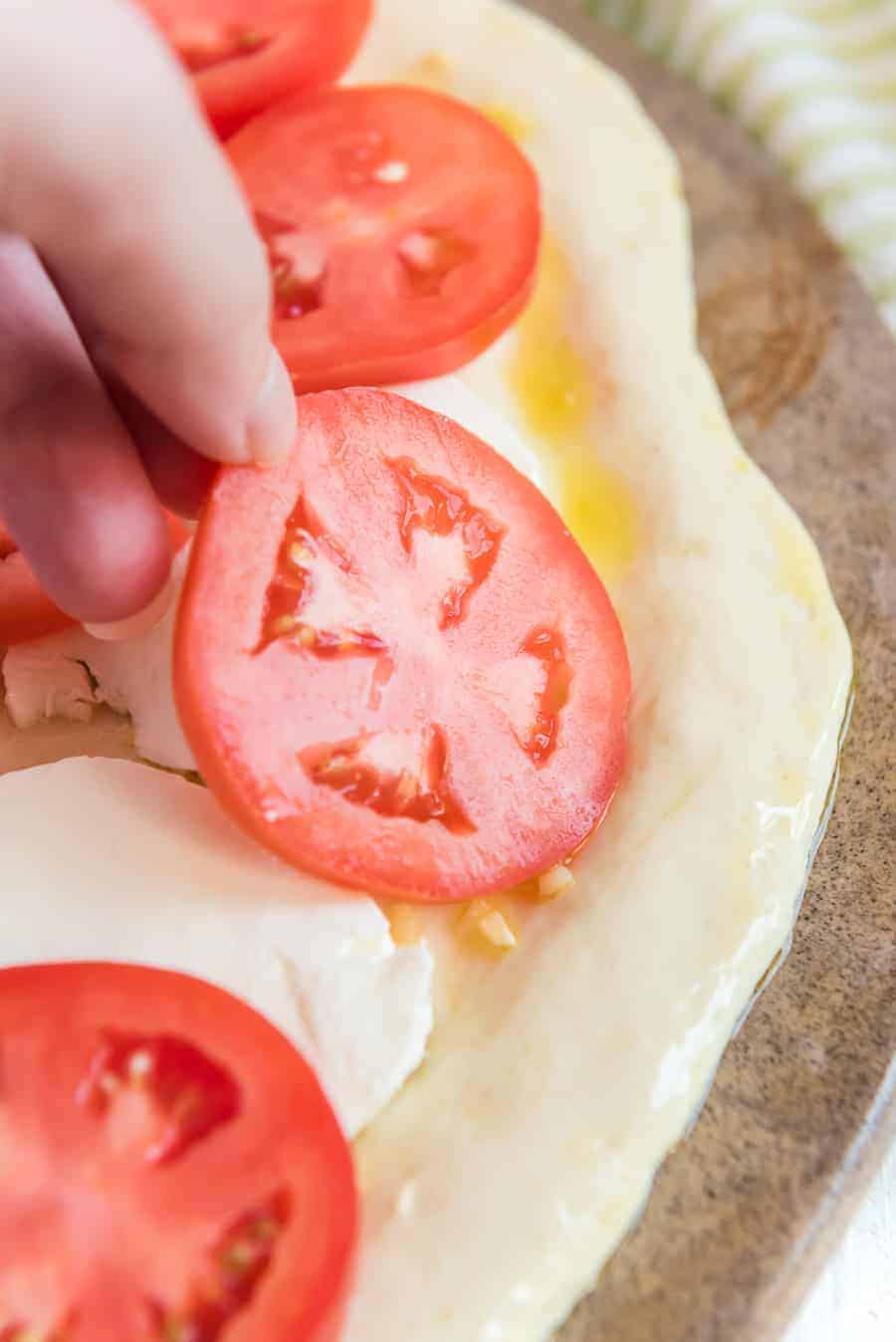 tomatoes on margarita pizza.