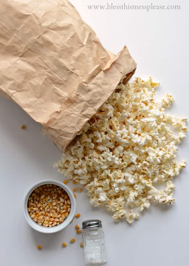 Quick and easy guide on how to pop popcorn in the microwave using just a paper bag, no oil needed.
