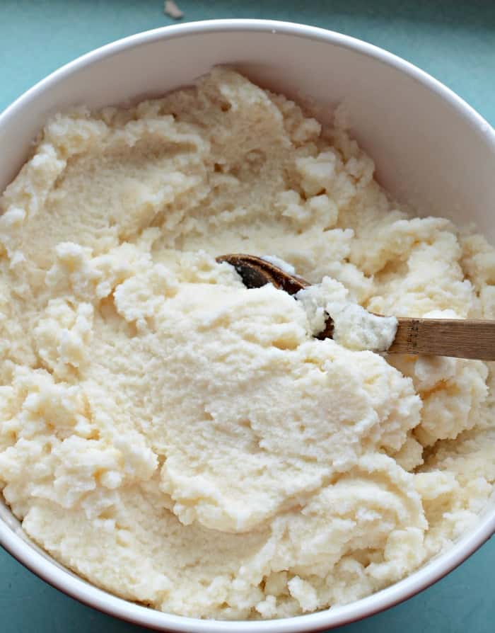 A bowl of white food, reminiscent of freshly fallen snow, brings to mind a delightful Snow Ice Cream Recipe.