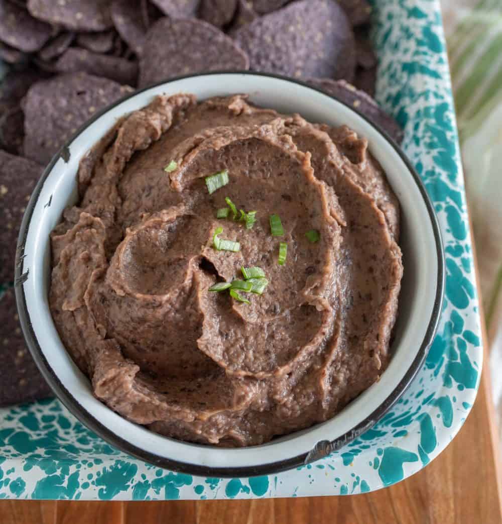 close up view of a bowl of black bean dip