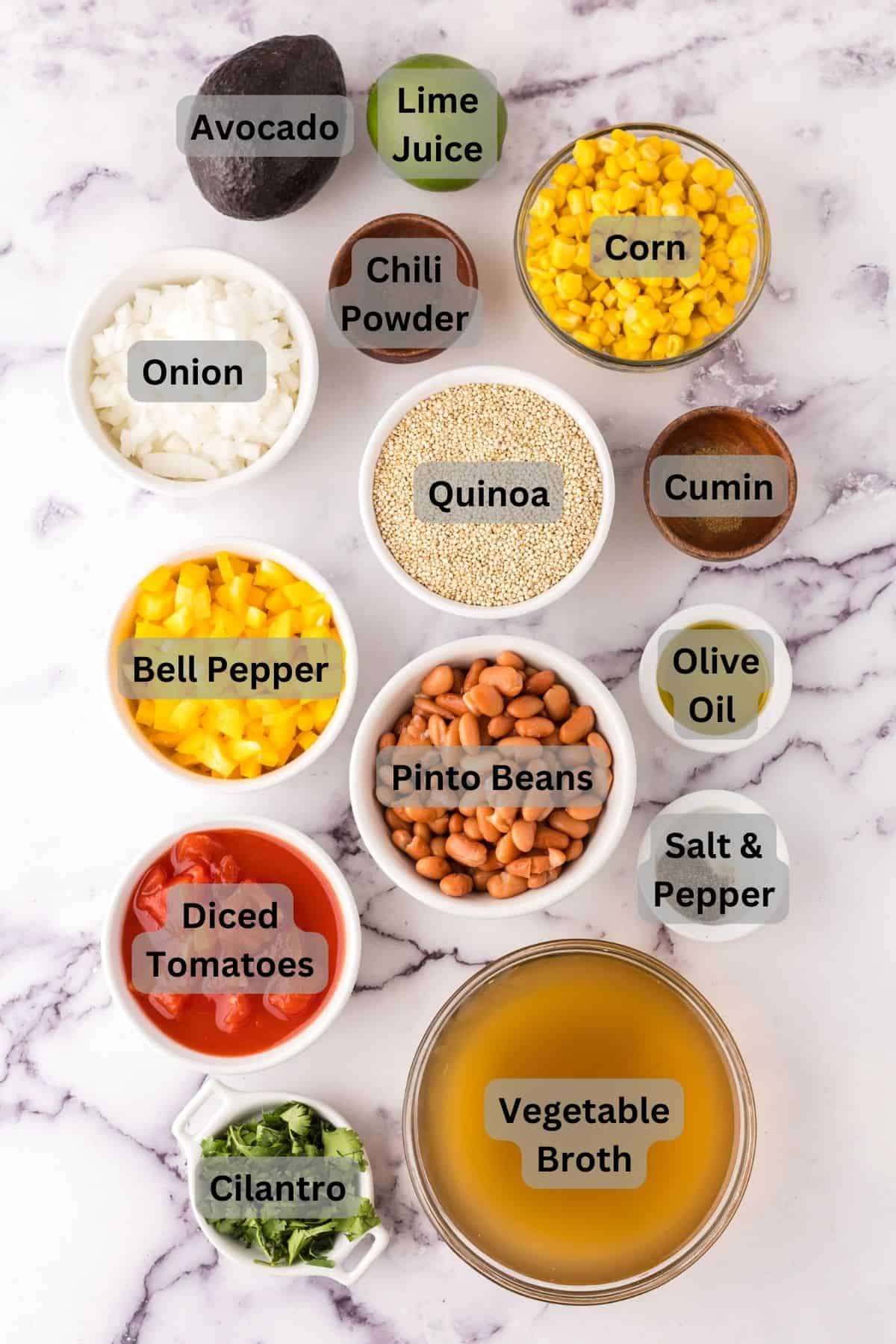 portion bowls each with raw ingredients to make one pot quinoa taco casserole recipe.