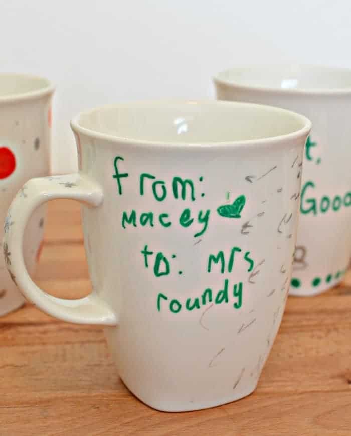 A painted sharpie mug made by a kid for her teacher.