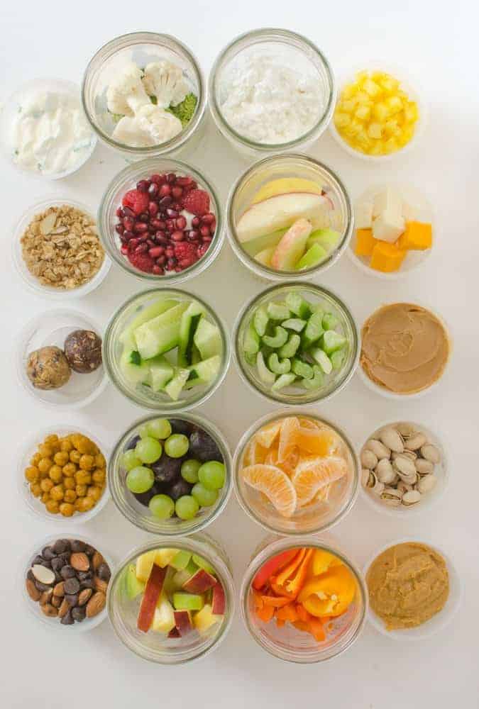 10 Healthy Snacks in Mason jars and divider cups.