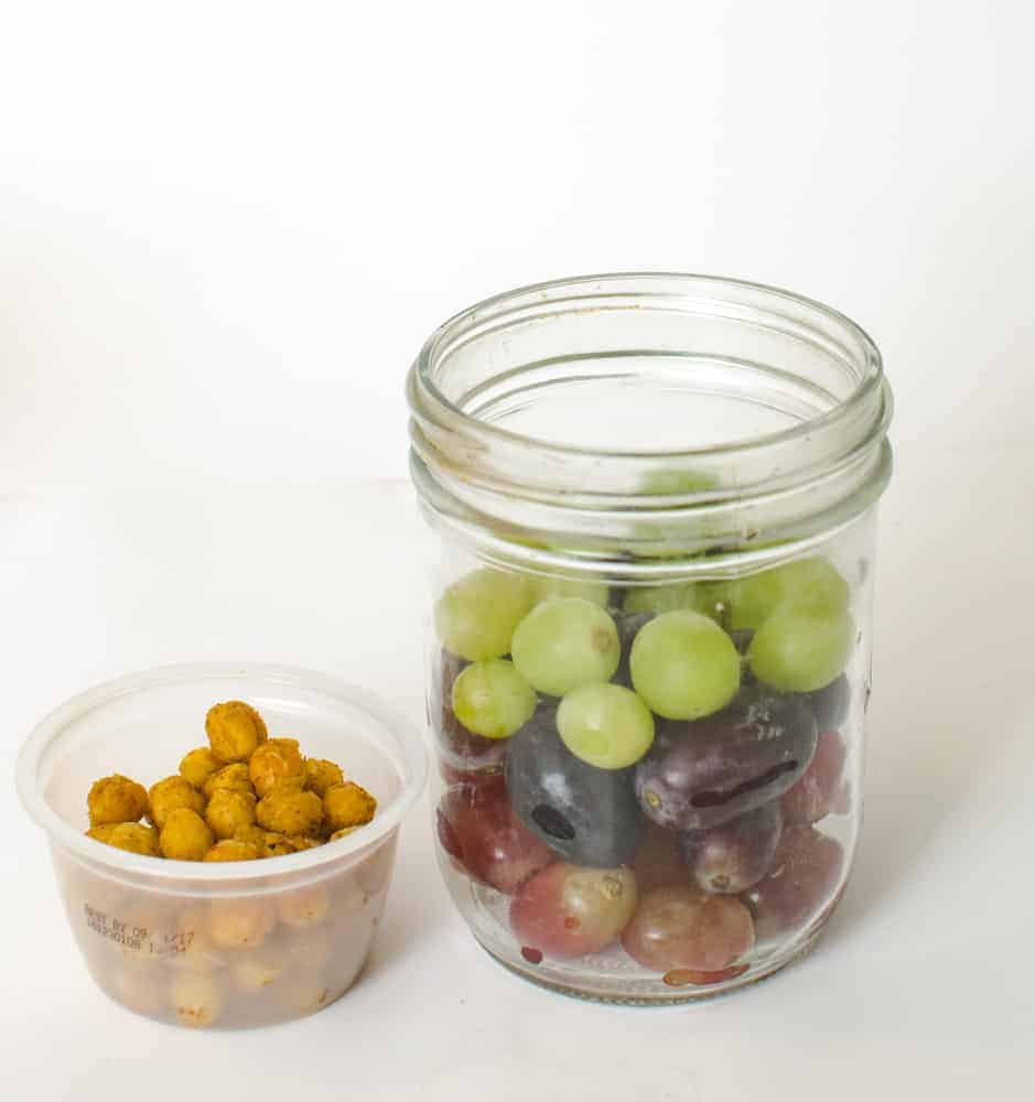 Grapes and roasted chickpeas in a Mason jar.