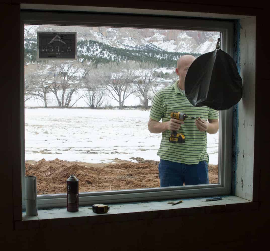 Flashing the basement windows.
