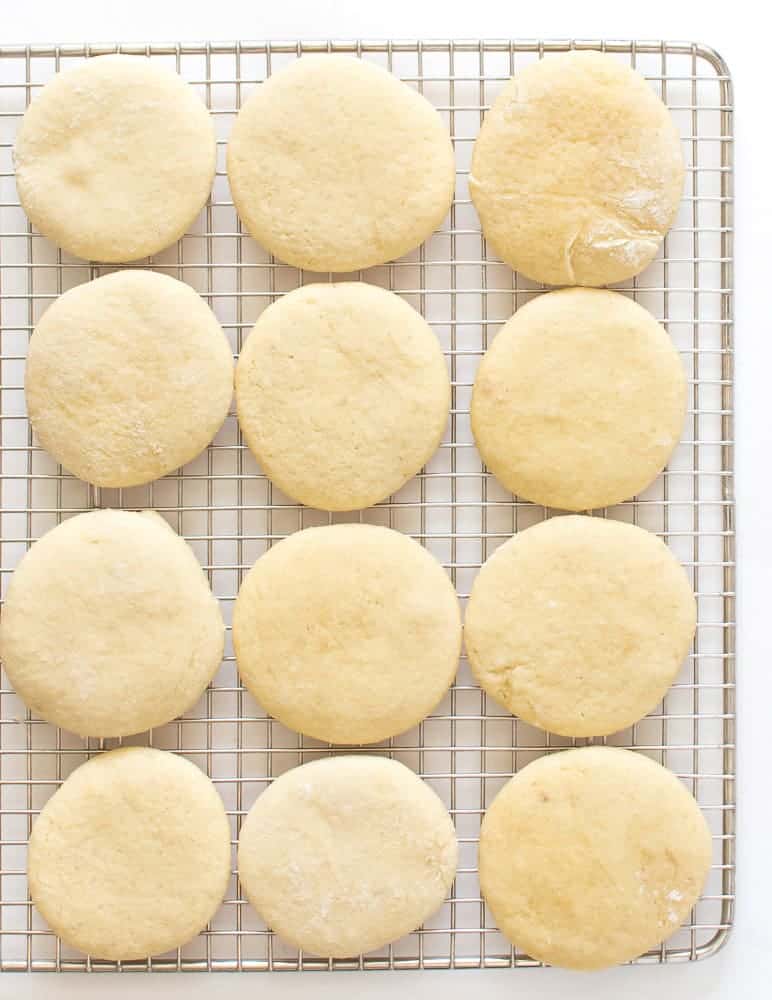 15 of the Best 4th of July Cookies on the Block unfrosted sitting on a wire cooling rack.