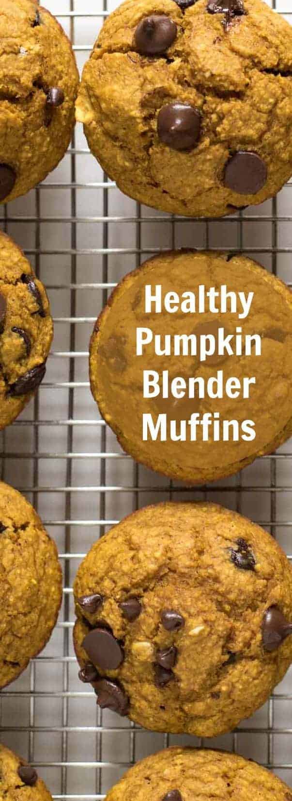 A close-up of pumpkin and chocolate chip muffins on a metal cooling rack. The center muffin has the text Healthy Pumpkin Blender Muffins written across it.