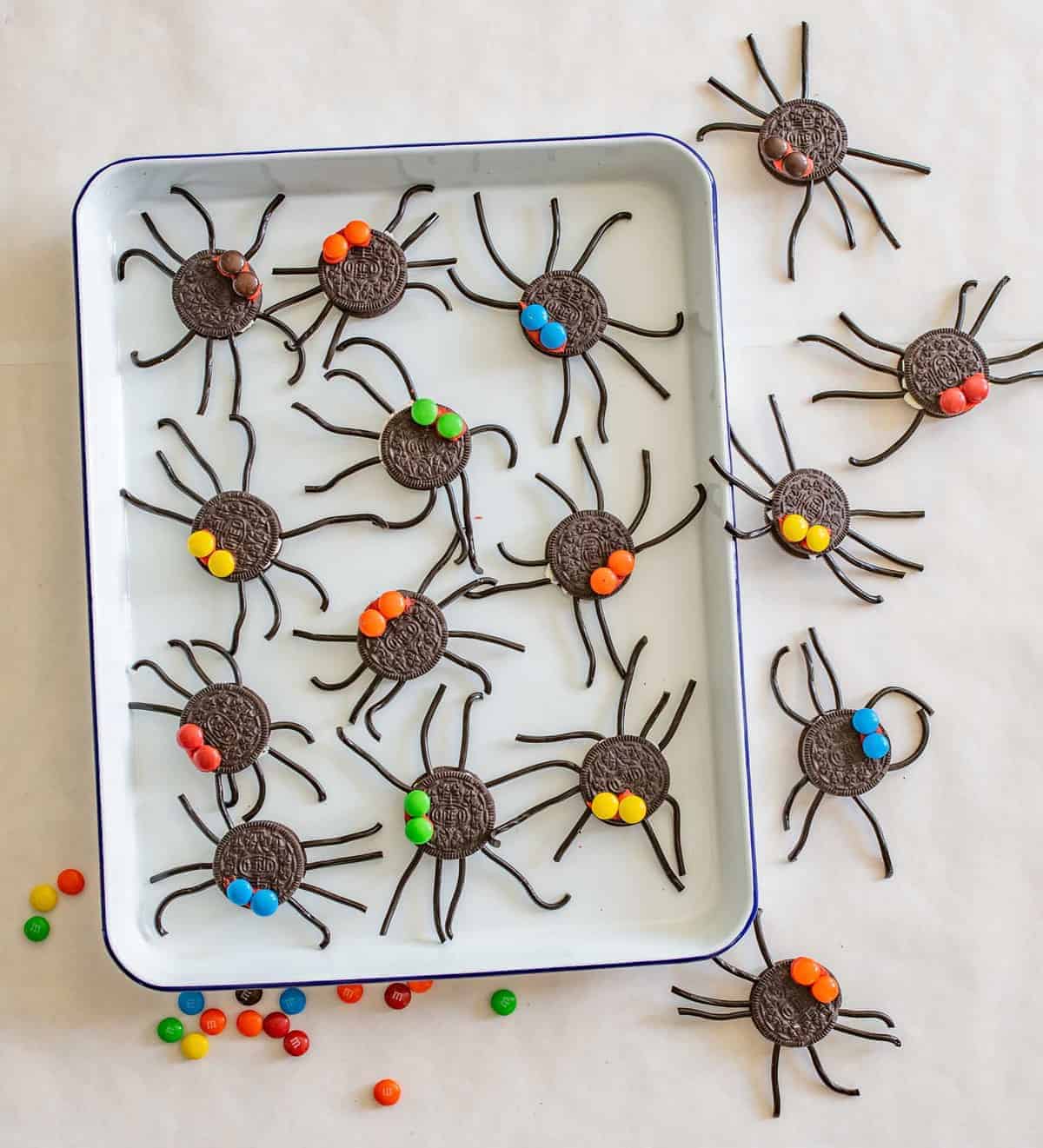 Easy Oreo Spider Halloween Snacks are made with cookies, licorice, and chocolate candies and make the perfect edible craft project.