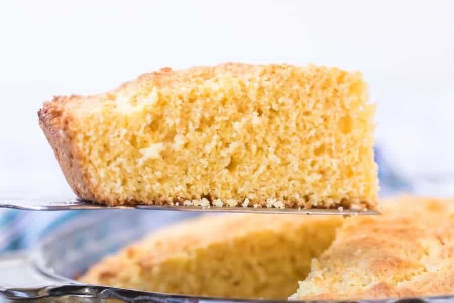 slice of sour cream cornbread on spatula.