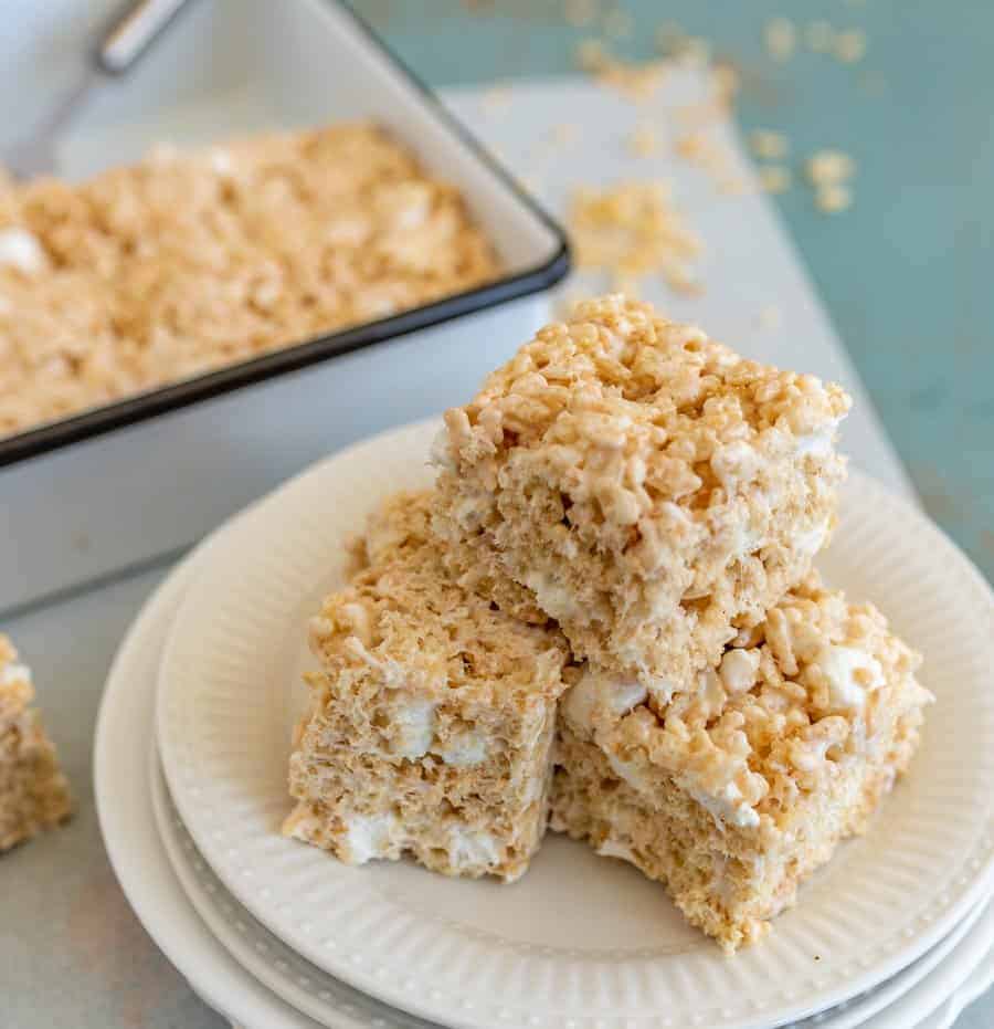 A stack of rice krispies on plates, ready to enjoy—perfect for anyone searching for a classic rice krispie treats recipe.