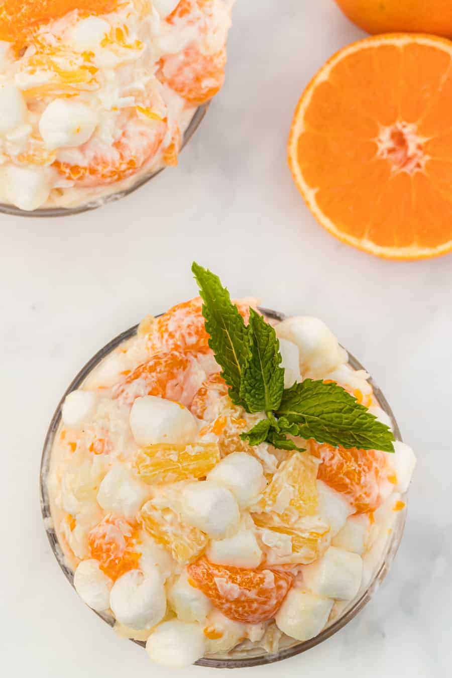 oranges and marshmallows in a "6 cup salad" in a glass dish