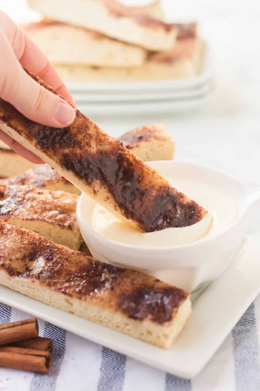 These warm, easy cinnamon sticks are SO good. They taste a lot like Pizza Hut’s cinnamon sticks, but not as greasy on the bottom.