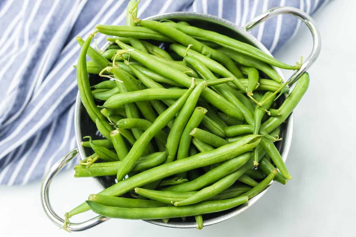 Green beans with butter and bacon is a hearty and flavor-filled side dish that takes green beans from plain to irresistible with just a handful of ingredients.