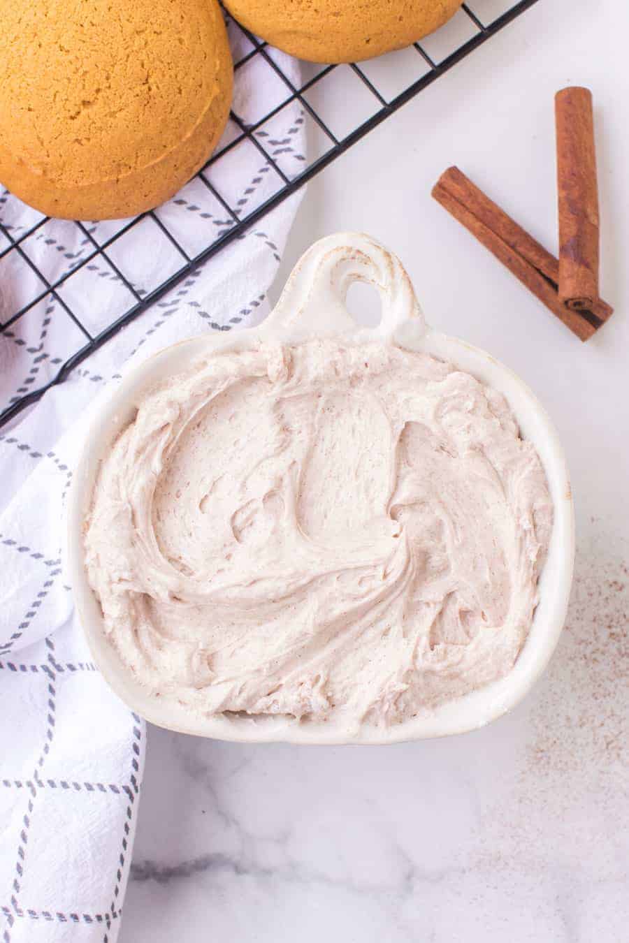 cinnamon cream whoopee pie filling in a pumpkin shaped bowl.