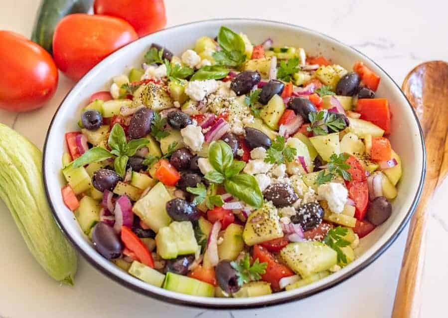 A refreshing and easy taste of summer, this Mediterranean cucumber salad is packed with fresh ingredients and flavors that you can totally make your own!