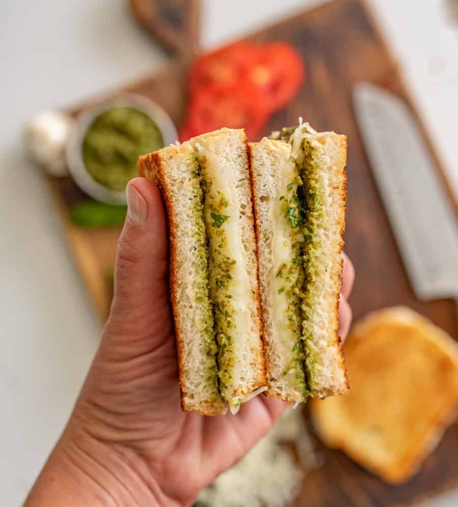 Pesto grilled cheese sandwiches are a super fun and delicious way to simply dress up the classic handheld lunch staple with tried-and-true flavors that taste heavenly together.