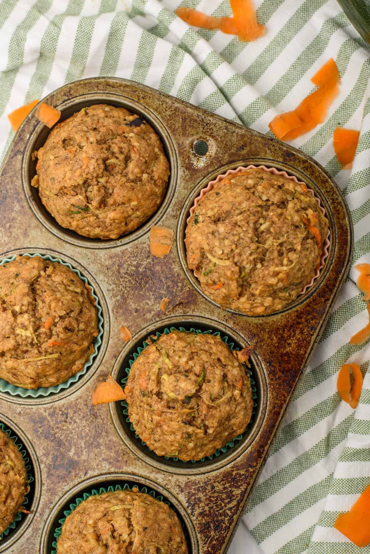 zucchini Muffins in a muffin tin.