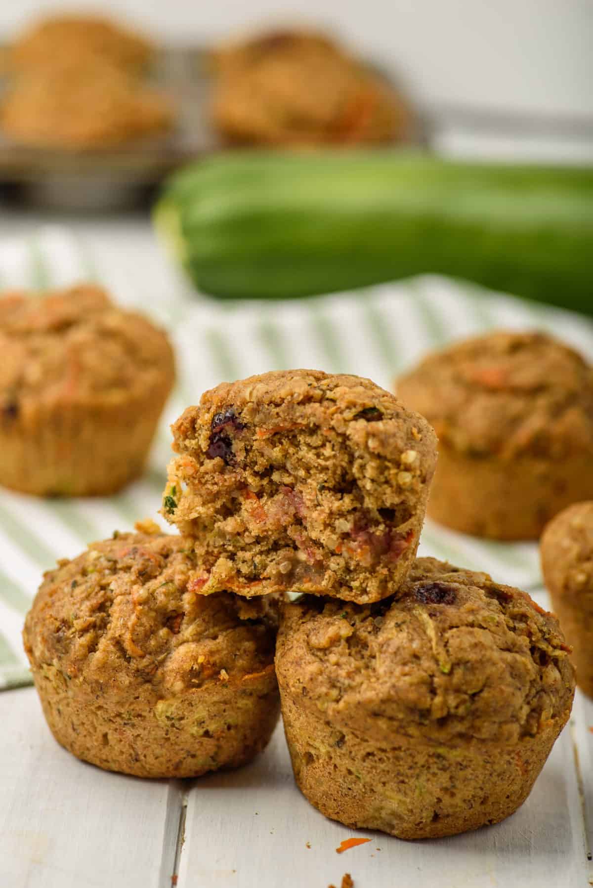 zucchini muffins in a pyramid stack.