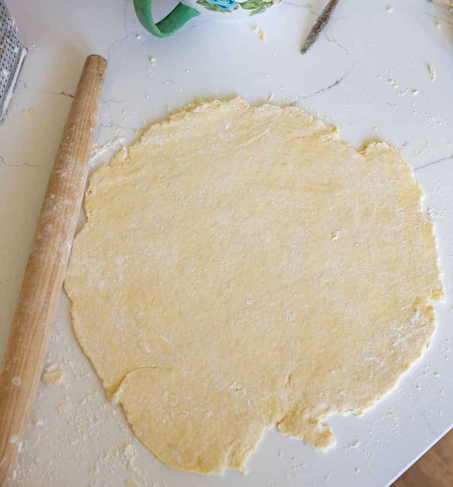 rolling out a pie crust