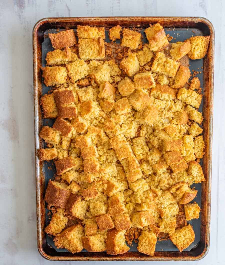 cornbread squares on baking dish.