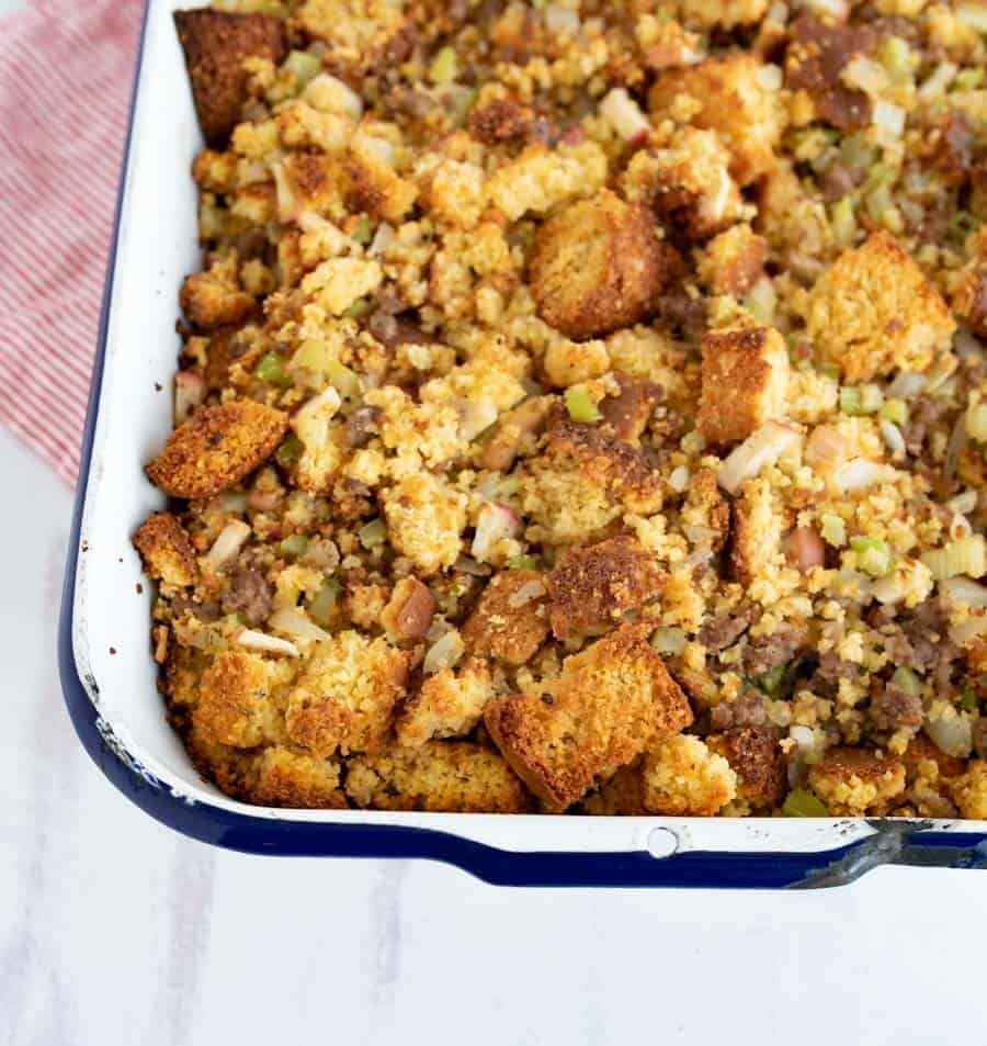 top view of close up of cornbread dressing in white dish.