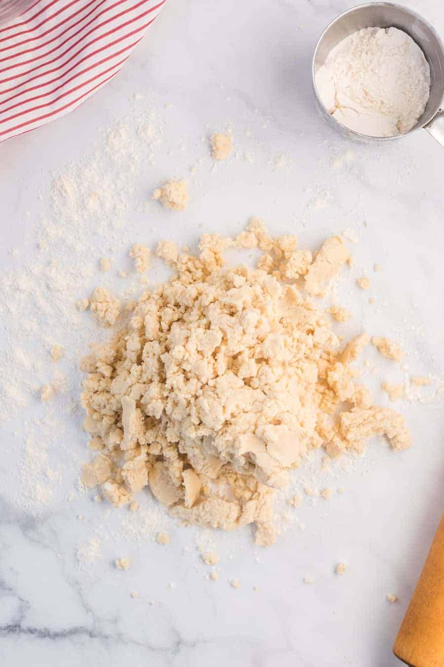 crumbles of shortbread cookie dough before being balled and rolled