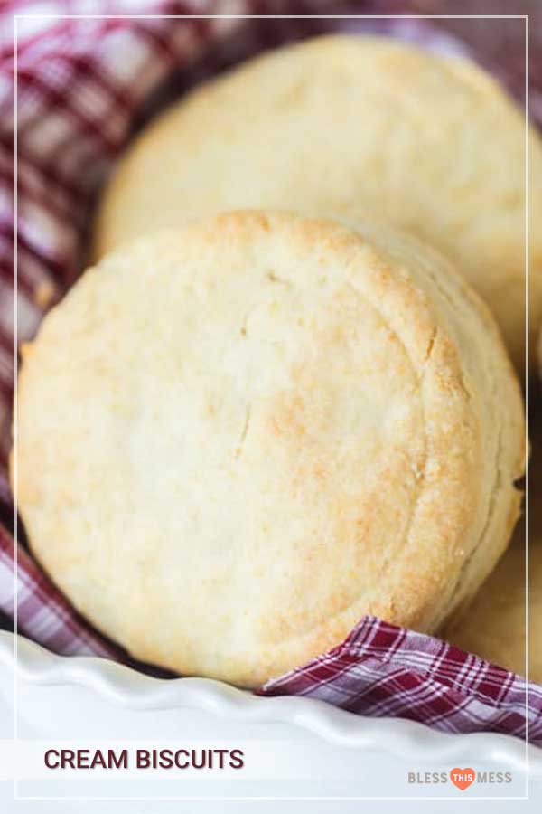 cream biscuits in red and white towel.