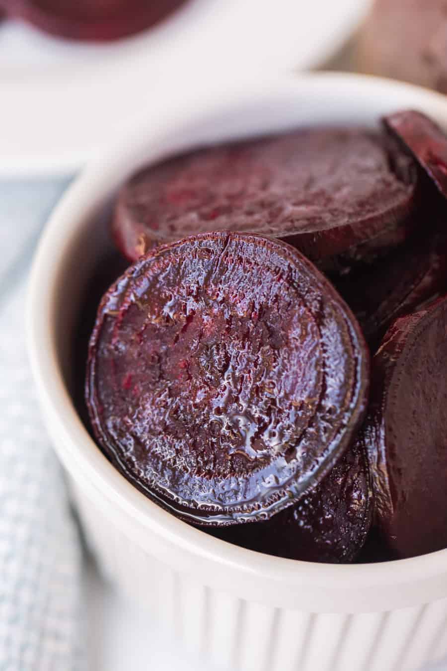roasted beets in white ramekin.