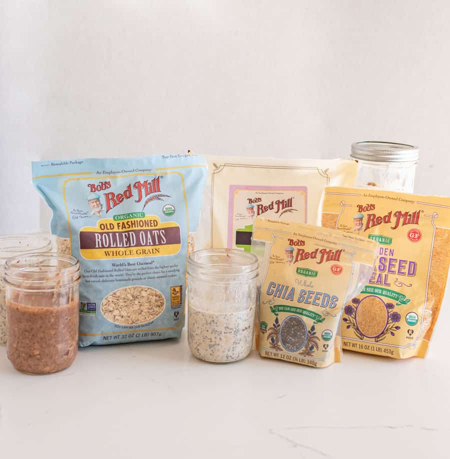 overnight oat ingredients like Bob's Red Mill oats, chia seeds, and coconut in packages.