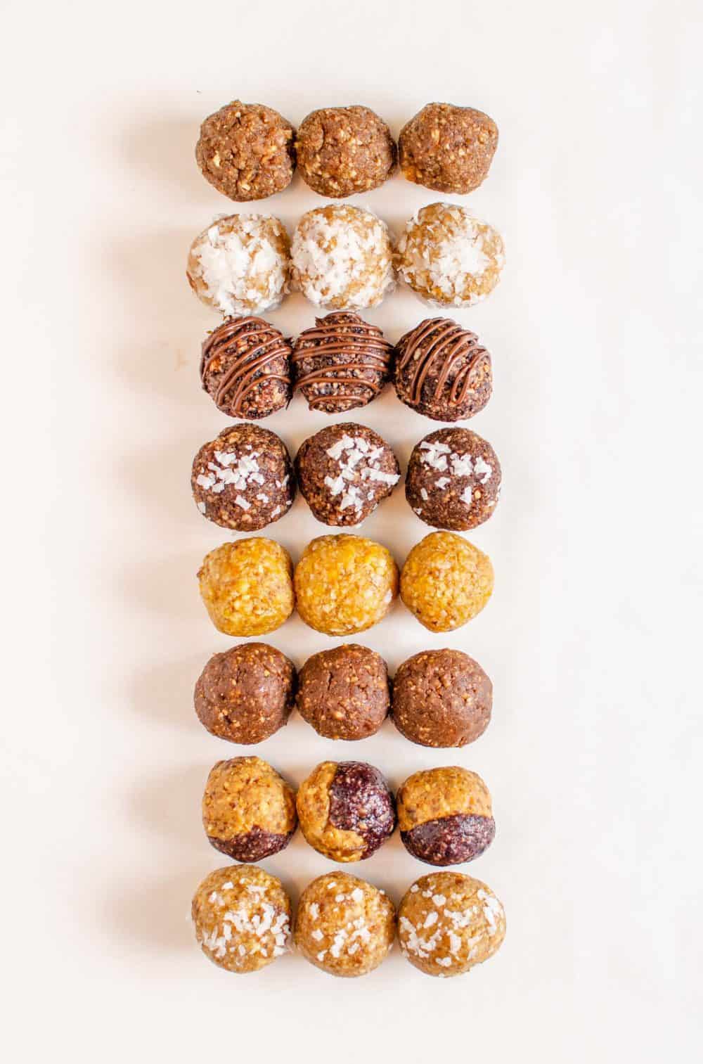 Rows of different types of date energy bites.