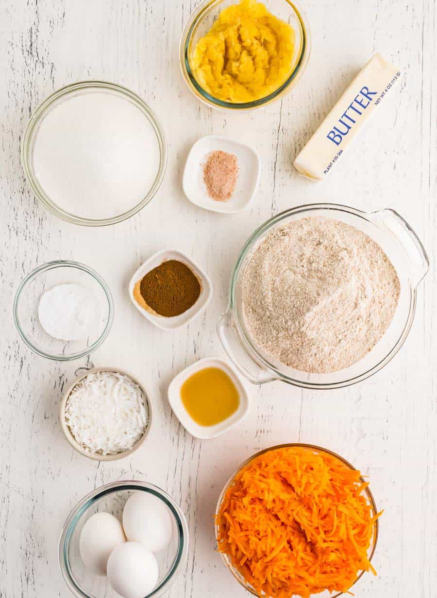top view of ingredients for morning glory muffins in bowls