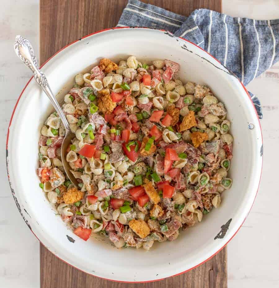 A large bowl of chicken bacon ranch pasta salad