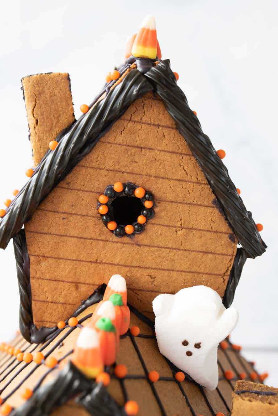 close up view of the roof and second story of Halloween gingerbread house