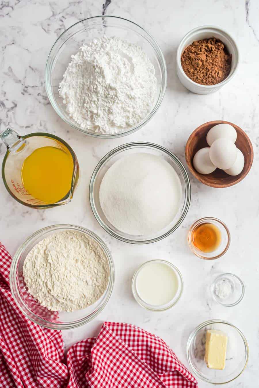 top view of ingredients for brownies in bowls.