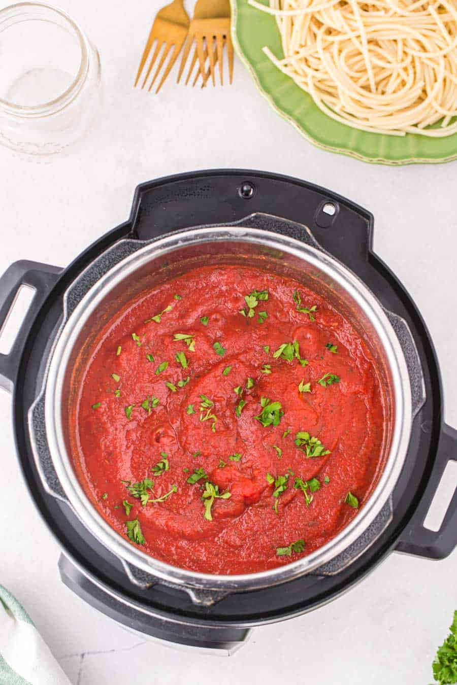 top view of instant pot with red spaghetti sauce