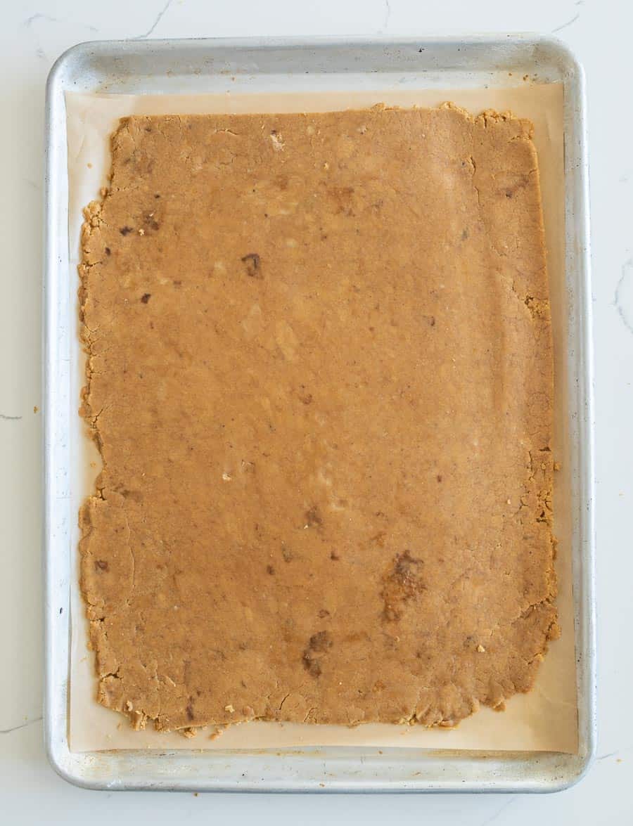 raw gingerbread dough on a sheet pan