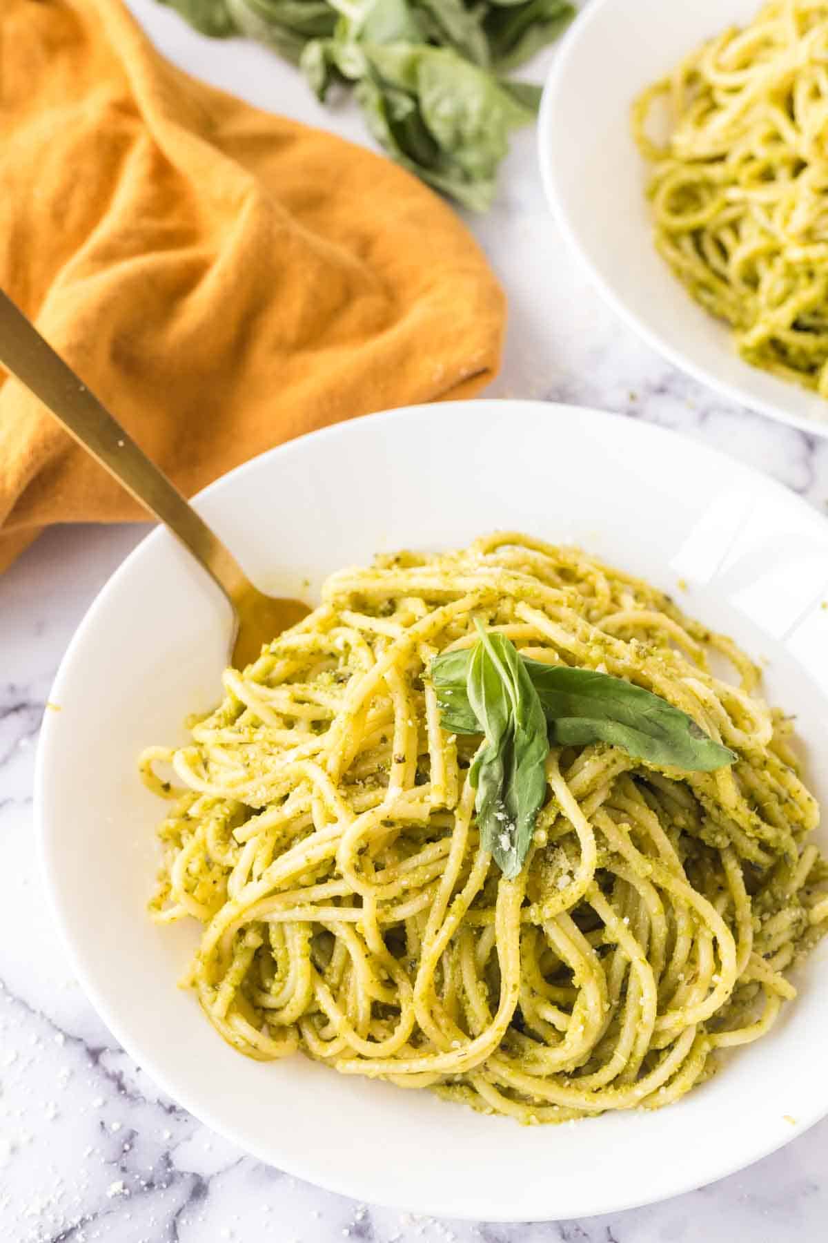 pesto pasta on a white plate