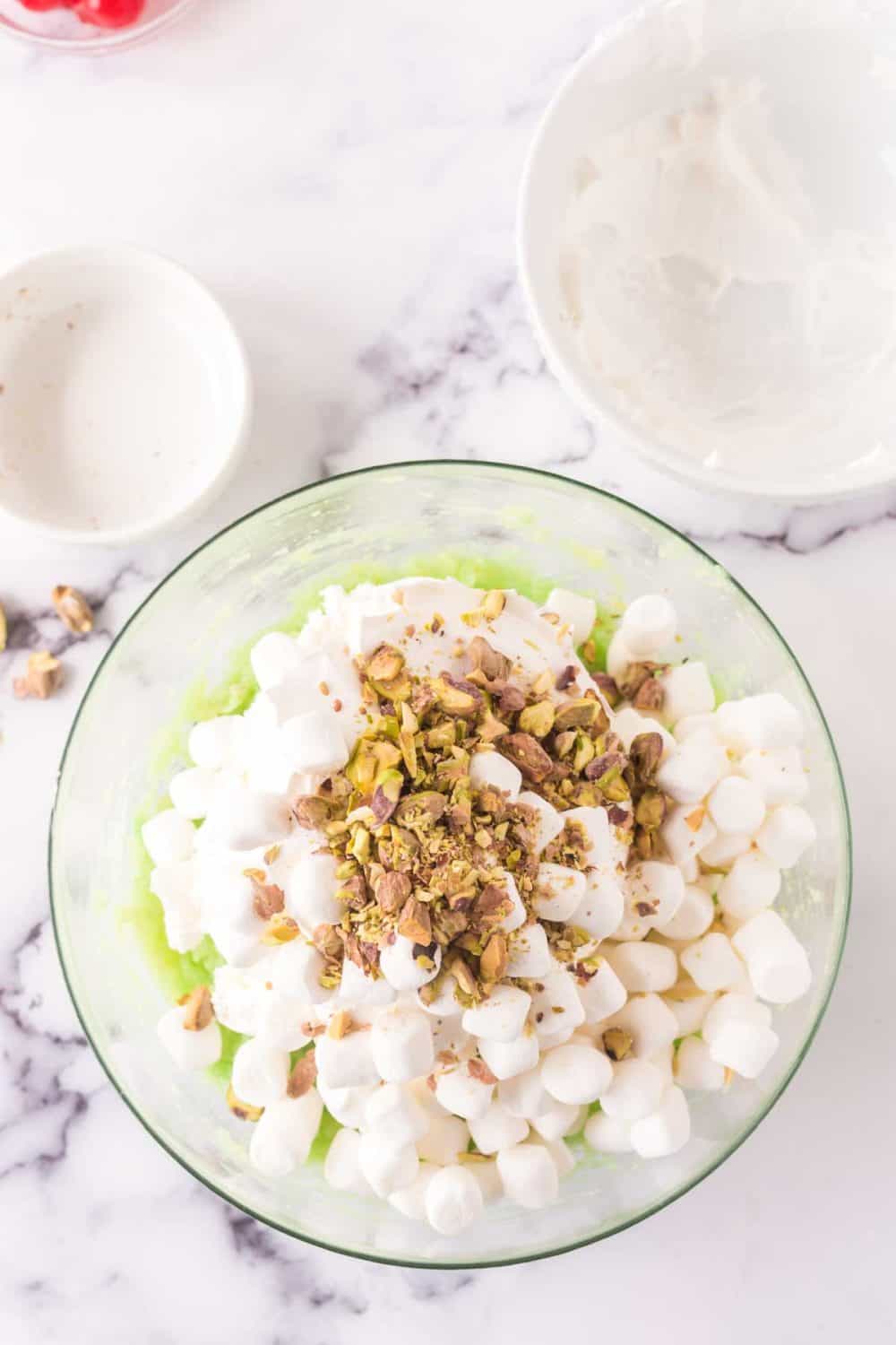 pistachio jello salad ingredients coming together.