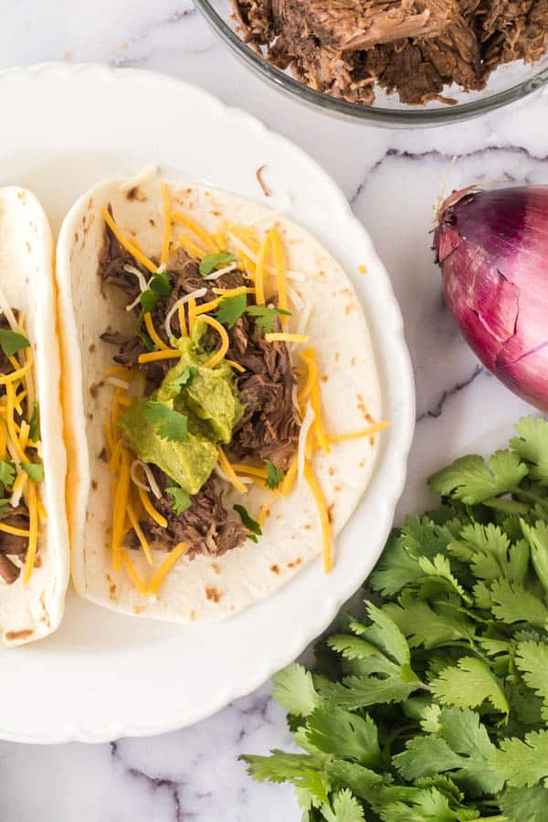 barbacoa tacos on a plate