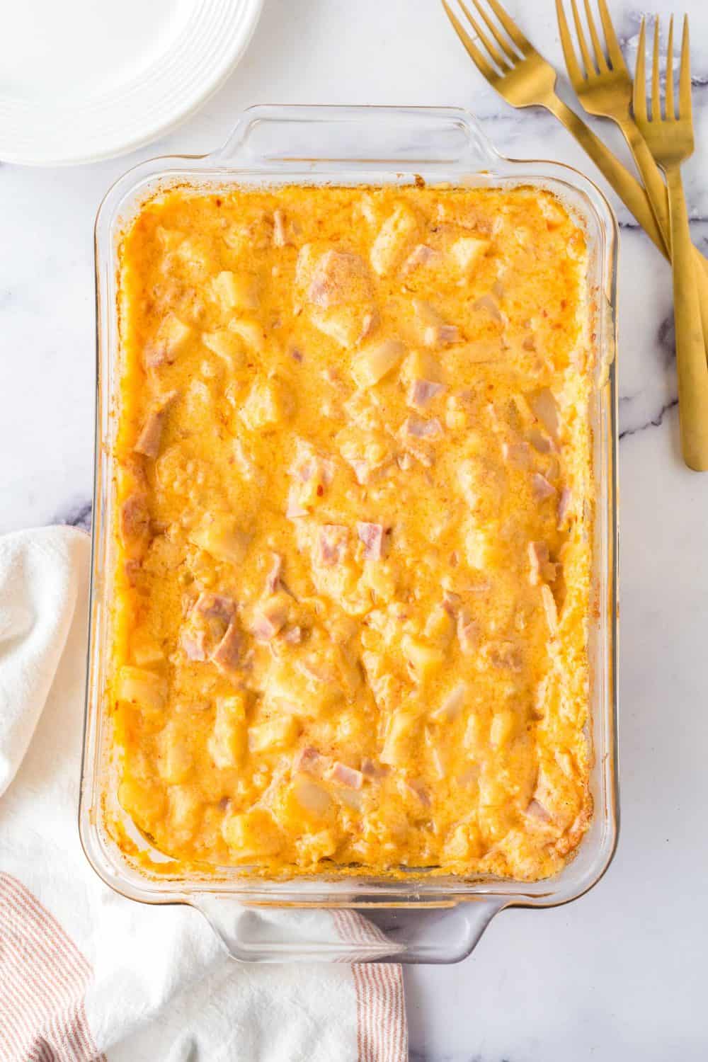 top view of a baking dish of of ham and potato casserole