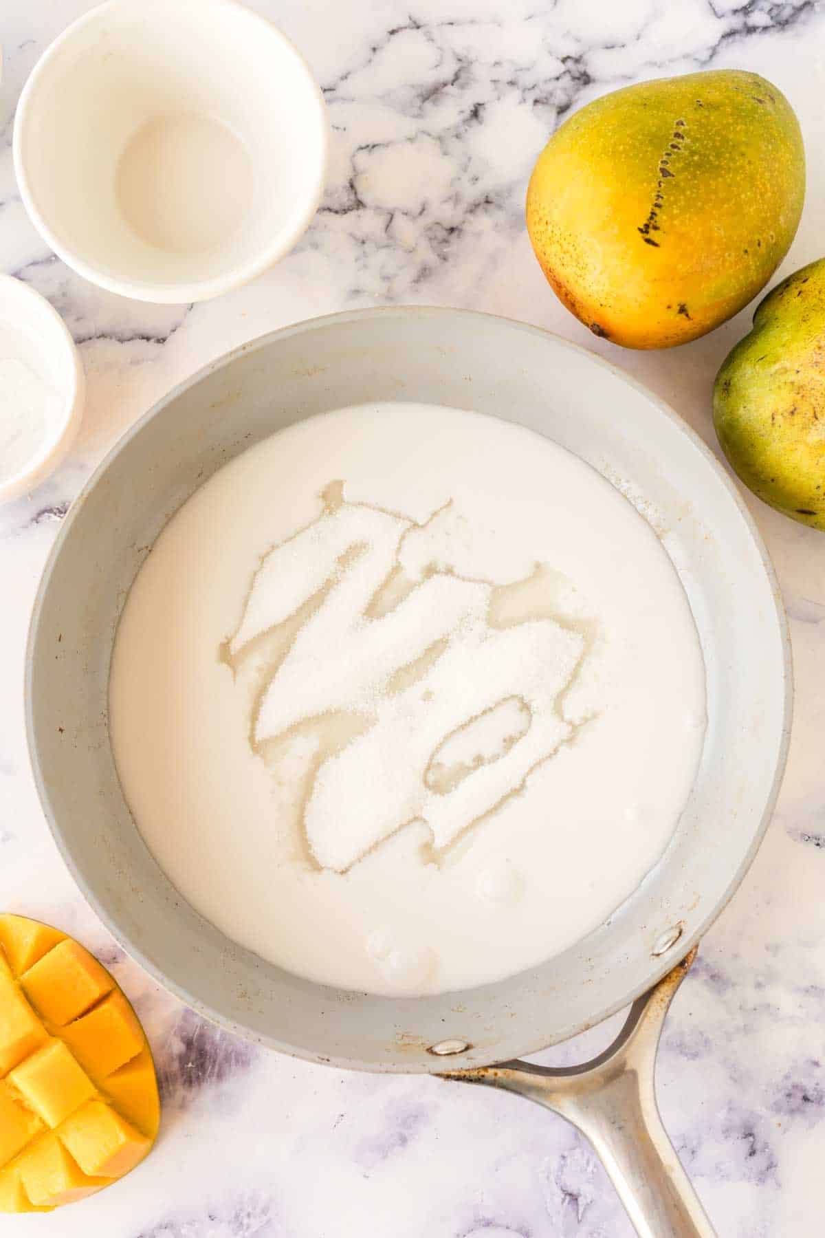 sugar being melted down before mango sticky rice