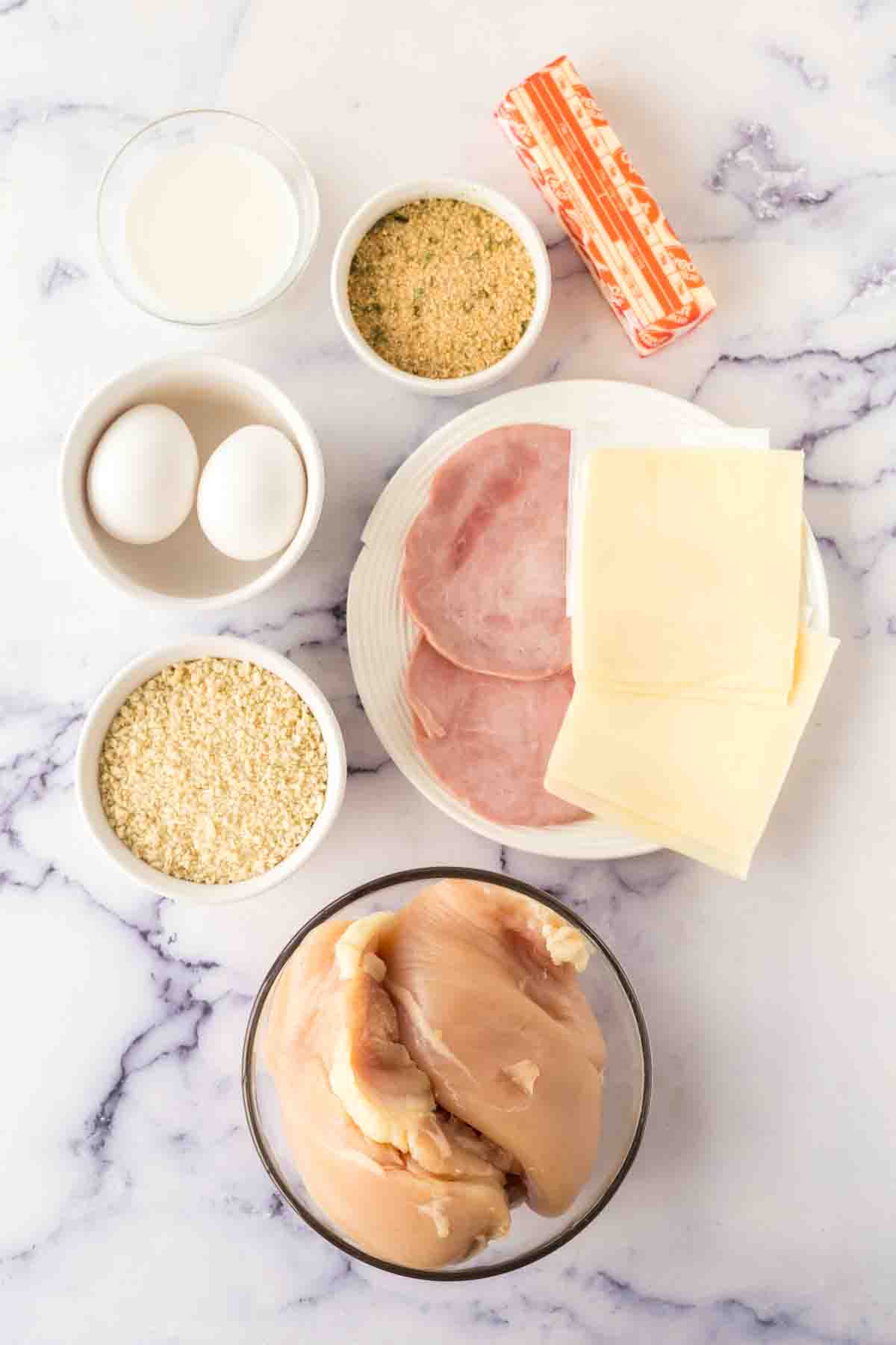 portioned raw ingredients for chicken cordon bleu recipe