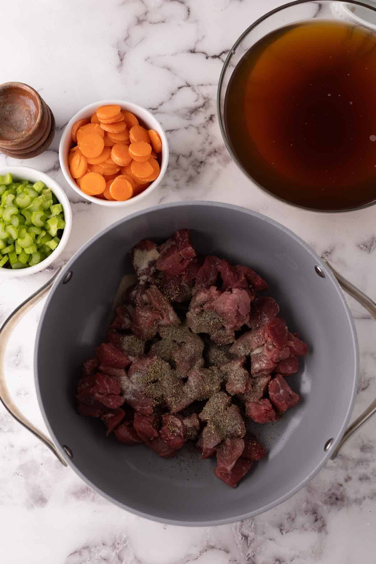 process of the pot and other raw ingredients to make beef noodle soup.