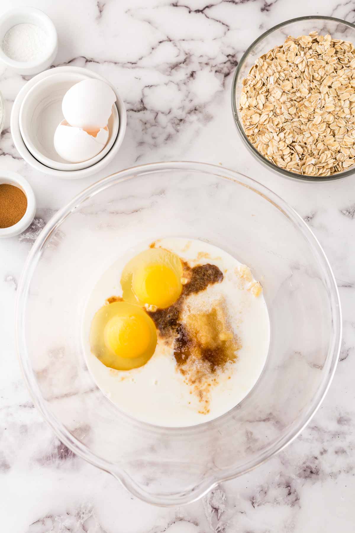 clear mixing bowl with breakfast bar ingredients in progress.