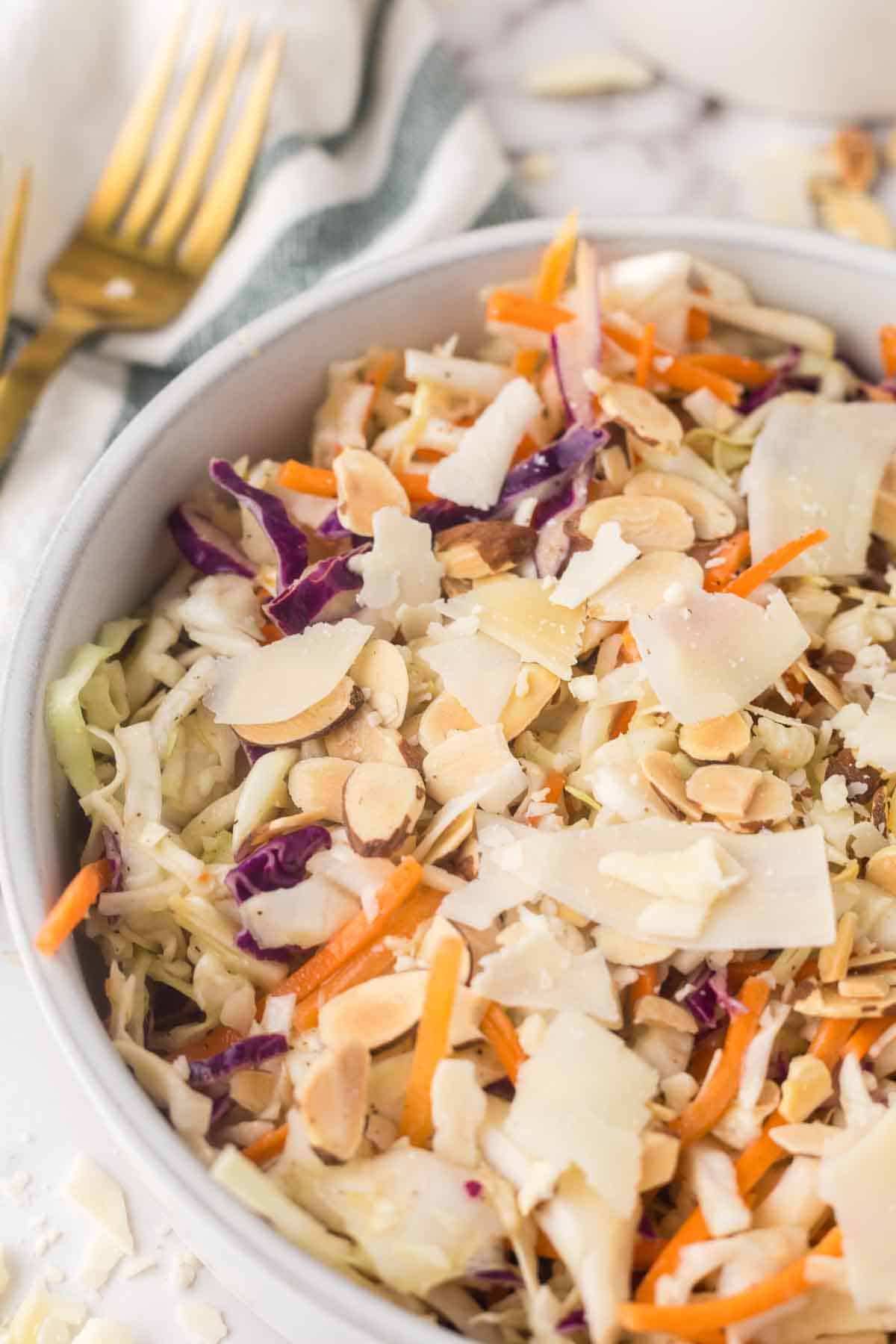 cabbage salad recipe in a white bowl.
